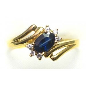 ring goud 9K met saffier en CZ